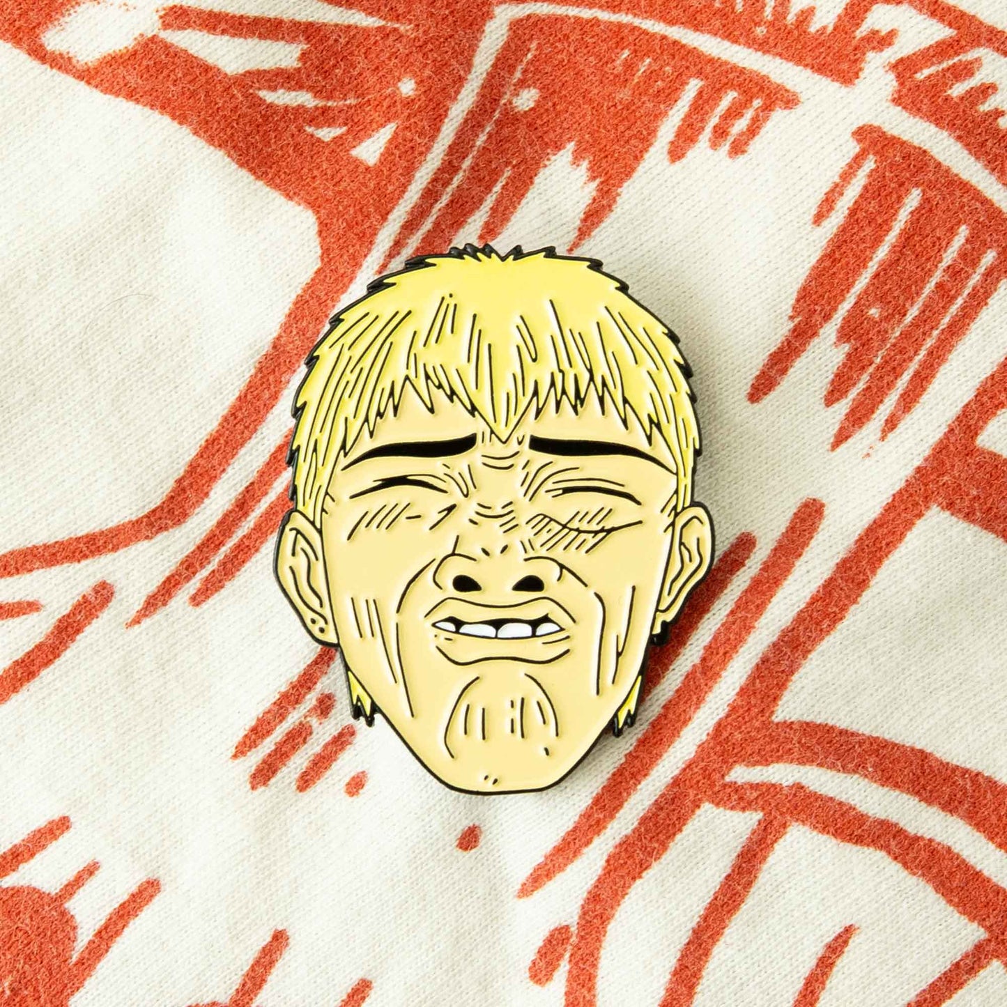 An enamel pin design of the fictional character, Eikichi Onizuka, from the classic anime series, Great Teacher Onizuka.
