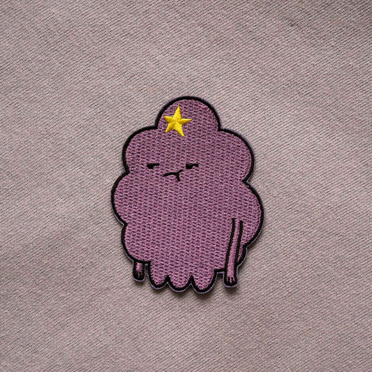 An iron-on patch of Lumpy Space Princess, from the animated series Adventure Time.